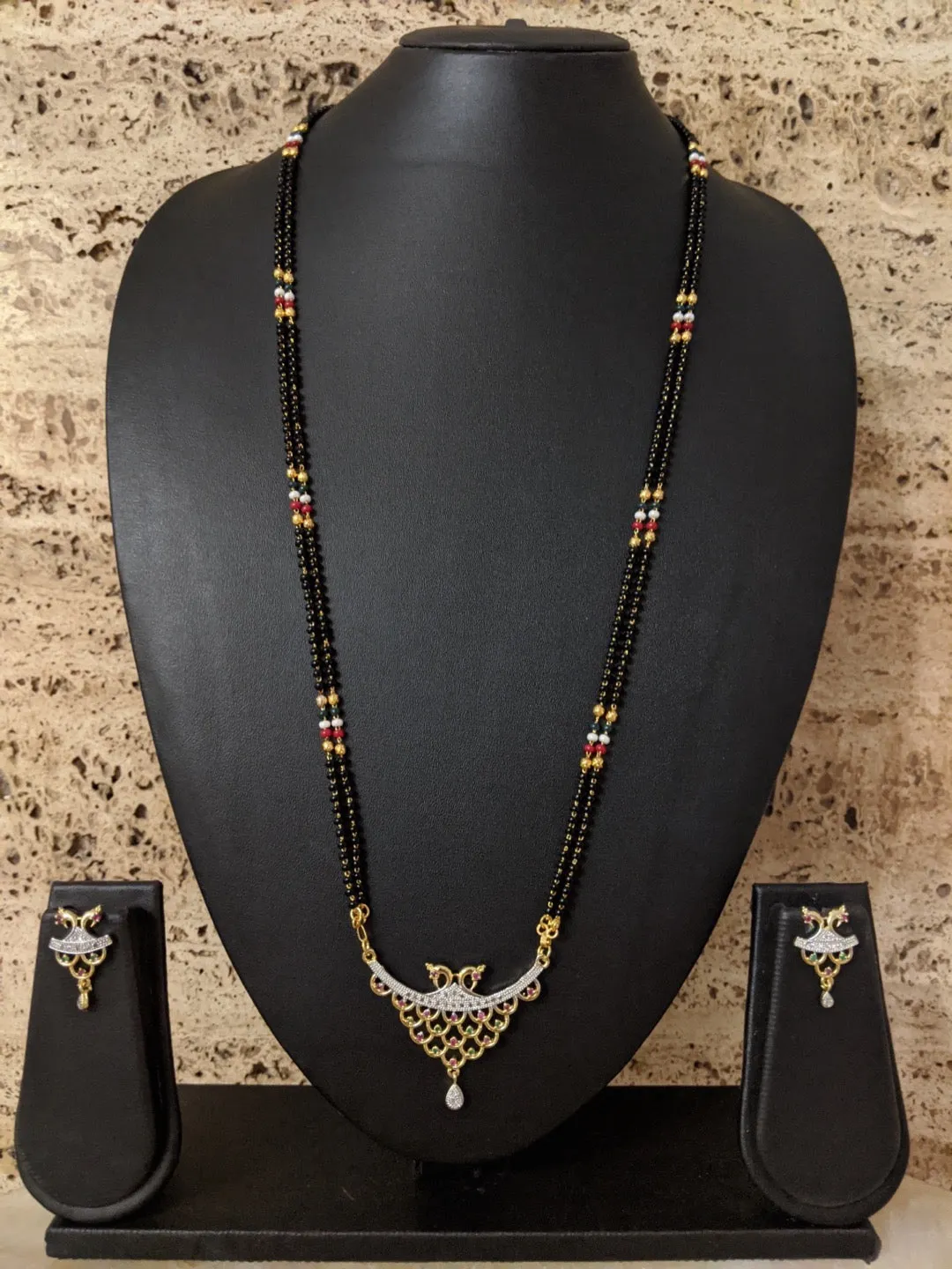 Long Mangalsutra Designs set with diamond earrings gold mangalsutra Peacock design multicolor chain